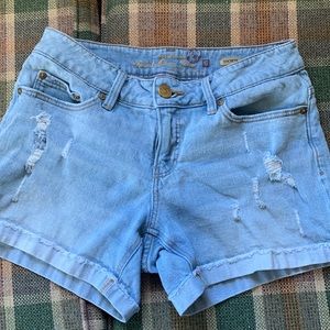 Light wash faded glory distressed jean shorts.